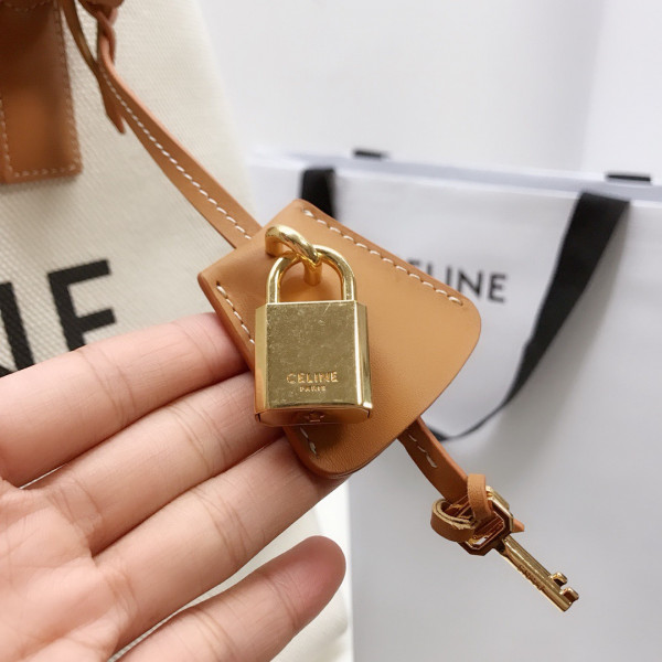 Ce**e horizontal cabas Ce**e in canvas with Ce**e print and calfskin