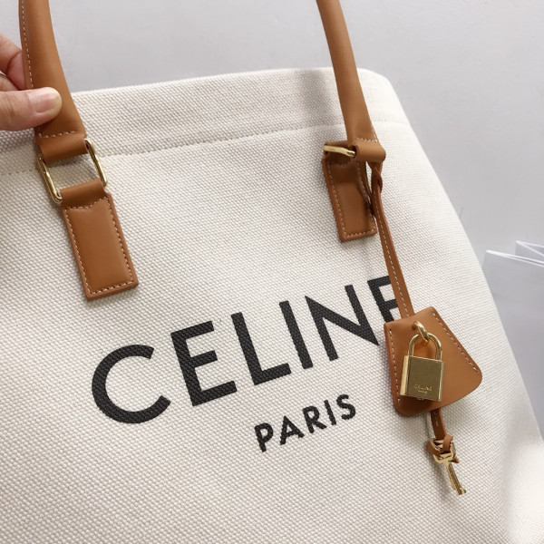 Ce**e horizontal cabas Ce**e in canvas with Ce**e print and calfskin