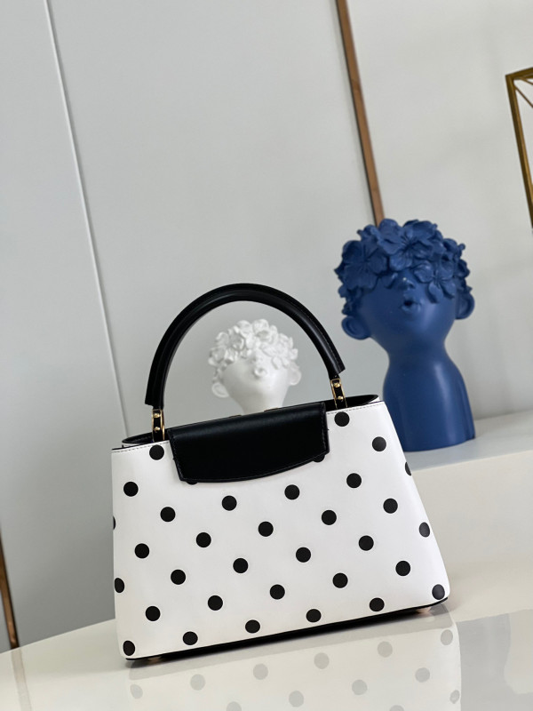 l**is V*t*n capucines mm