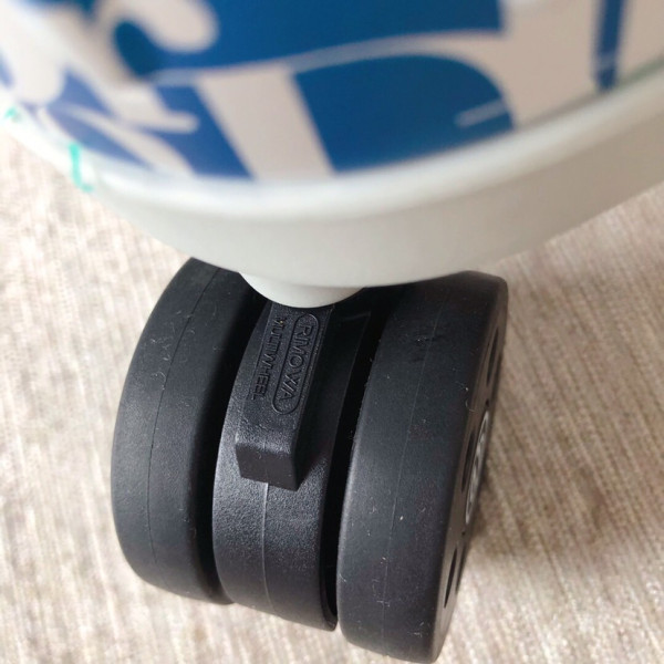 D*or x rimowa suitcase