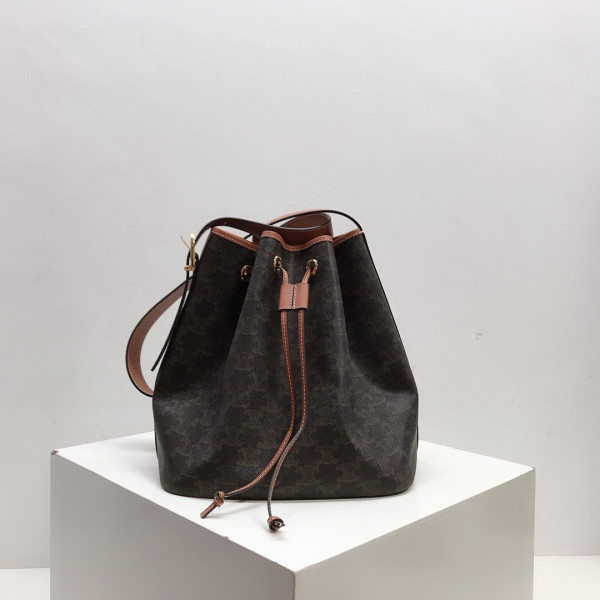 Ce**e medium drawstring bag in triomphe canvas