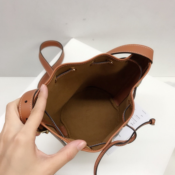 Ce**e small drawstring bag in triomphe canvas