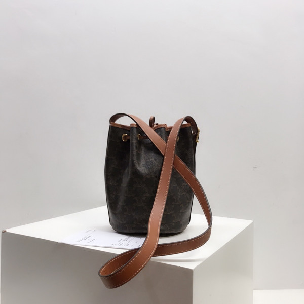 Ce**e small drawstring bag in triomphe canvas