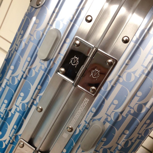 D*or x rimowa suitcase