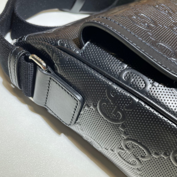 G*u*i gg embossed messenger bag