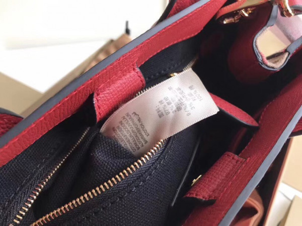 B**rry the small banner in leather and house check