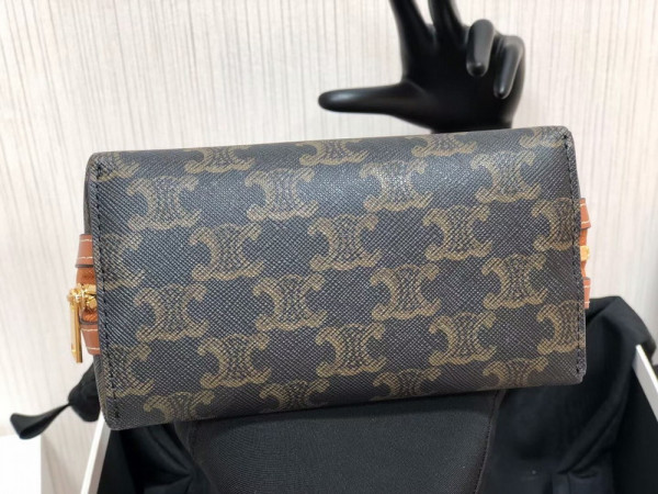 Ce**e clutch on chain in triomphe canvas