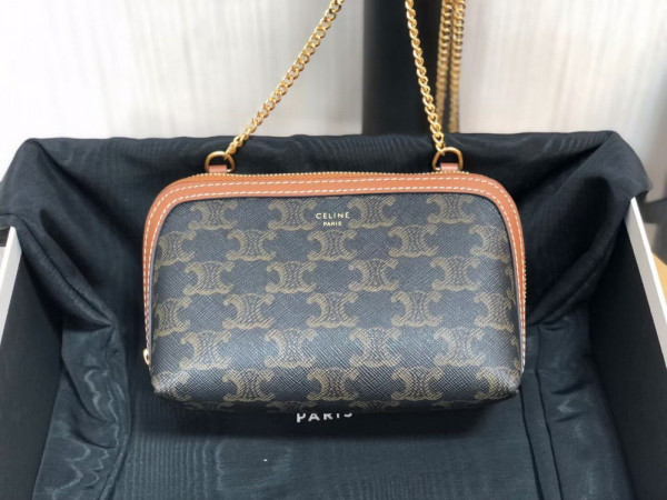 Ce**e clutch on chain in triomphe canvas