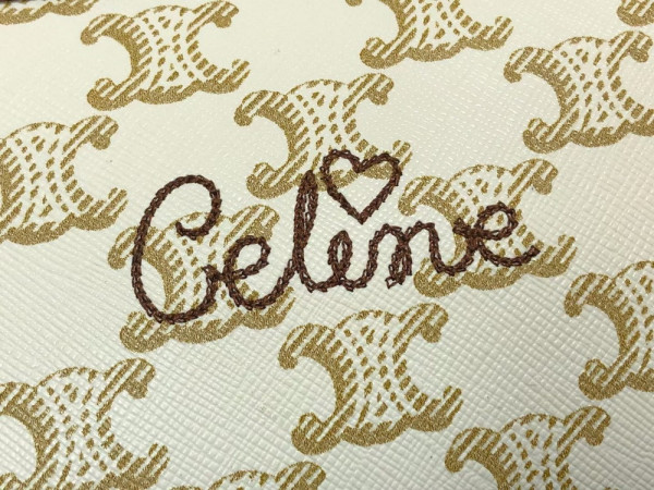 Ce**e clutch on chain in triomphe canvas